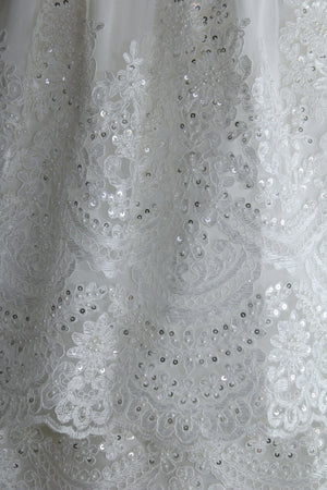 Close view of the Elyza gown lace embroidery