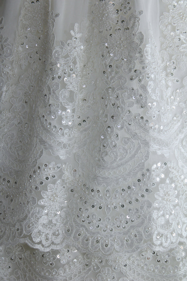 Close view of the Elyza gown lace embroidery