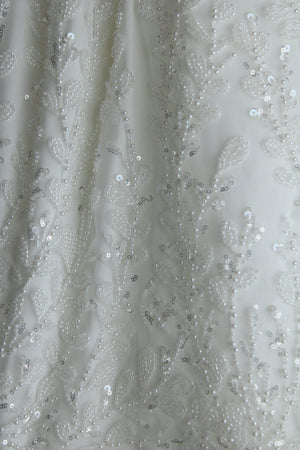 Anahi baptism gown with puffed sleeves and pearl and crystal accents