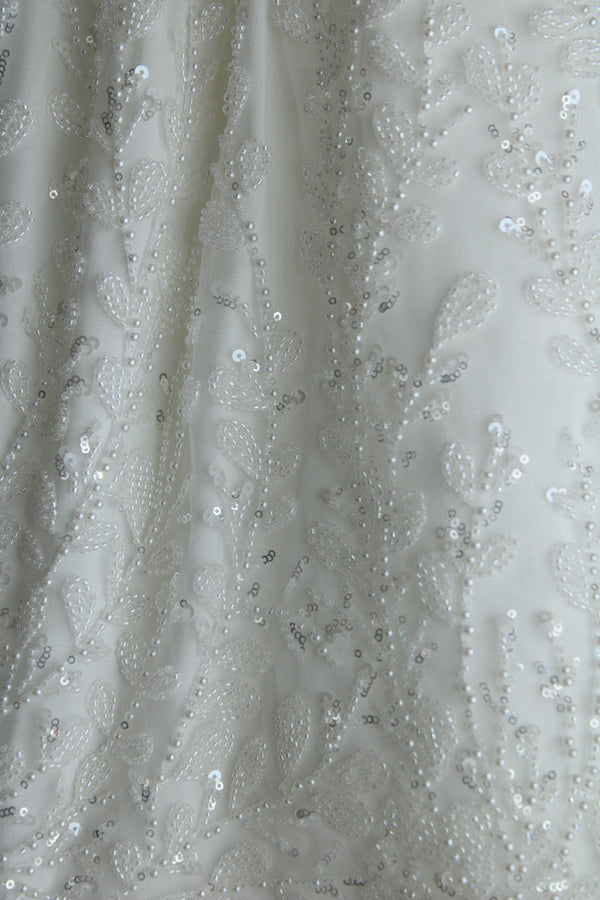 Anahi baptism gown with puffed sleeves and pearl and crystal accents